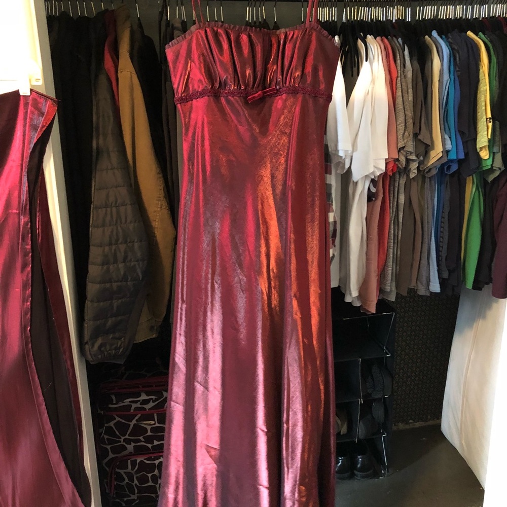 Maroon silky, shimmery dress with shall.